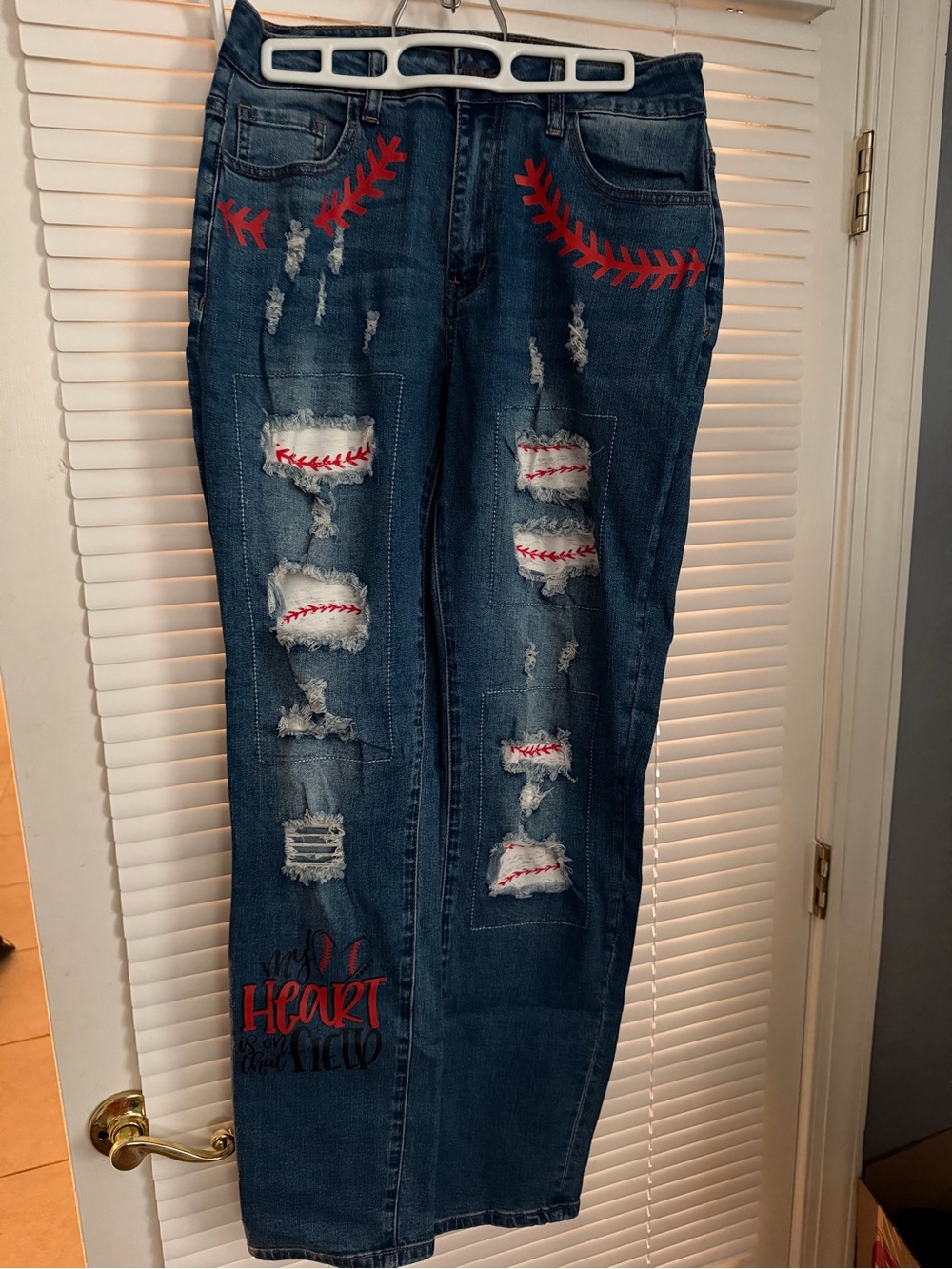 Dark Blue Distressed Women's Jeans with Red Baseball Stitch Accents